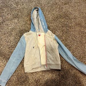 this is a tommy hilfiger denim jacket, size xs, never worn